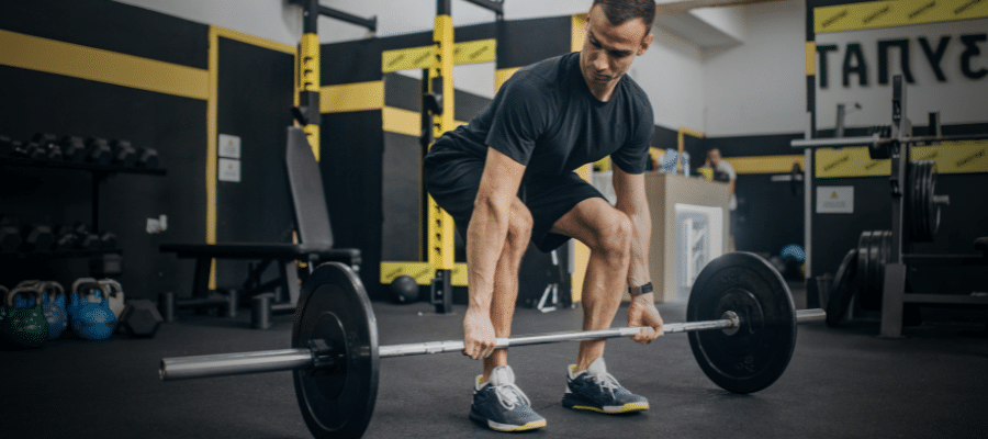 Soulevé de Terre Jambes Tendues Barre ou Haltères